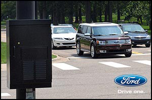 The smart intersection, established near Ford's Research & Innovation Center in Dearborn, communicates with specially equipped test vehicles to warn drivers of potentially dangerous traffic situations.