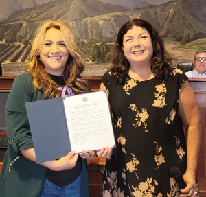 At Tuesday night’s city council meeting the city presented a proclamation for September 2025 as Suicide Prevention Awareness Month and encouraged community-wide participation in suicide prevent efforts. Pictured is Mayor Christina Villaseñor presenting Maya Zumaya with the proclamation.