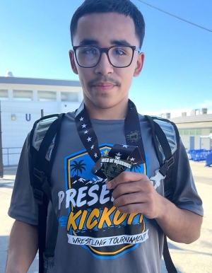 Congratulations to Jasiah Cervantes, posing with his medal won at the Tri Counties Wrestling Association Folkstyle Tournament. Photo Credit Chris Cervantes.