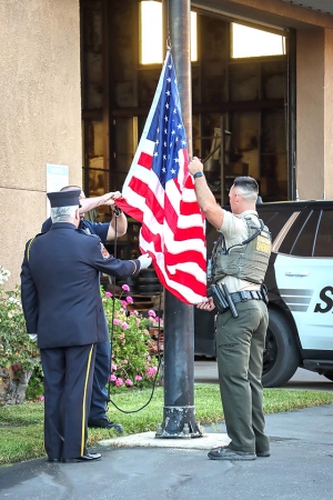 Above is last year’s 9/11 Remembrance ceremony. This year’s will be held Friday, 6:45am (correction) at the Fillmore Fire Station. Photo credit Angel Esquivel.