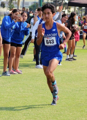FHS Varsity Senior Camilo Torres who led the boy’s team finishing in first place with a time of 15:26.70.