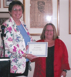 Betty Carpenter presents Jan Marholin, Principal of San Cayetano Elementary School, with the Soroptimist Making a Difference for Women Award for the dedication, devotion and significant impact she has made on the lives of students, school and community.