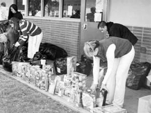 Volunteers setup gifts for the children.