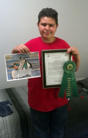 Chris Medrano of Fillmore winning honorable mention in the Junior Federal Duck Stamp contest.