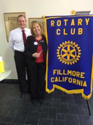 Rotary President Kyle Wilson welcomes Councilmember Carrie Broggie to Fillmore Rotary.