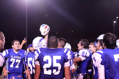 Celebrating after receiving the helmet