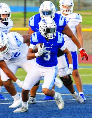 Above is Flashes Varsity #3 carrying the ball in the Blue & White Scrimmage this past Friday. Flashes will host their season opener this Friday, August 23, at 7pm in a home game against Royal High School. Photo credit Crystal Gurrola.