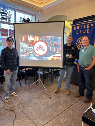 Pictured (l-r) is owner Preston Andreini and General Manager Daniel Flores from Red Engine Brewing Company with Fillmore Rotary President Elect Scott Beylik. Photo credit Rotarian Martha Richardson.