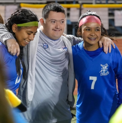 On January 10, 2024, the Fillmore Flashes Girls Soccer Team hosted AYSO Epic Night where the AYSO Epic Team attended a Meet & Greet with the team as well as run out on the field for the starting lineup in their game against Carpinteria. Pictured above are some of the kids smiling as they have their picture taken with the players. Photo credit Daniel Cruz.
Lady Flashes Girls Soccer hosted AYSO Epic Team last week, giving kids the chance to talk with the players, take photos and do a team cheer to end the night. Photo credit Daniel Cruz. 
