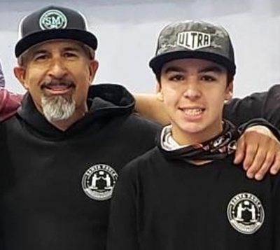 Brennon Ballard (right) and Jesse Segovia of Santa Paula CornholeBagggers, and one of Brennon's Sponsor.