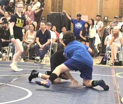 Above is FMS Bulldog Liam Patton during his match. Photo credit FMS Coach Michael Torres.