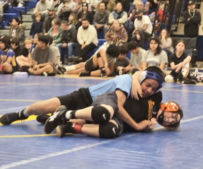 Above is Fillmore’s Chirstopher Padilla taking his opponent to the mat during his match against Ventura High. Photo credit FMS Head Coach Michael Torres.