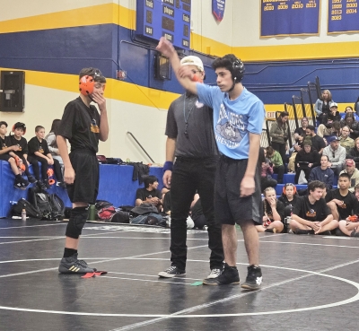Pictured is Flashes Elijah Sandoval claiming victory in his match against Ventura High School. Photo credit FMS Head Coach Michael Torres. See more photos online at www.FillmoreGazette.com.