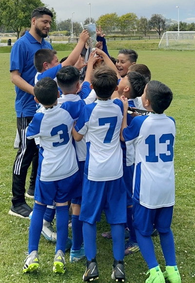 Pictured above is Fillmore’s California United FC 2016 Boys Team celebrating their victory last weekend in the NP Elite Spring League. Photo credit Alicia Arriaga. 