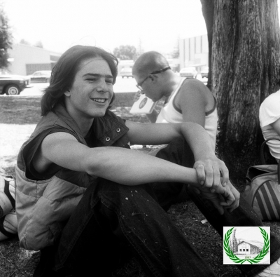 Can you identify the boy in the park?