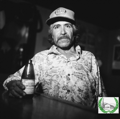 Can you identify the man in bar?