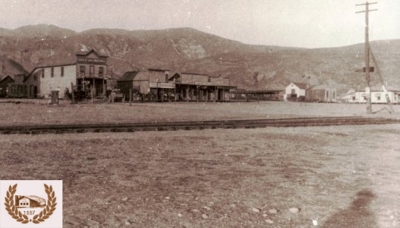Earliest photo of a pool hall in Fillmore. One of the three one story buildings in the center.