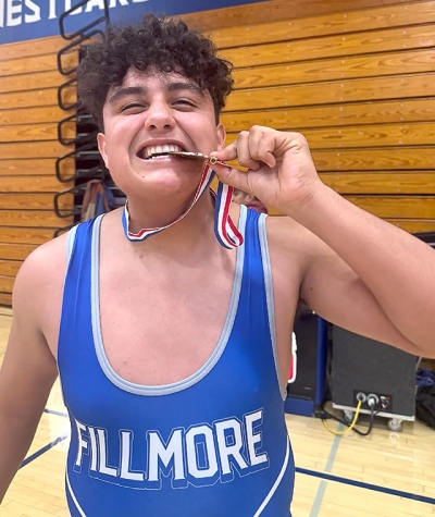 Flashes Valentin Garcia who placed 3rd in the tournament. Photo credit Boys Wrestling Head Coach Manuel Ponce.