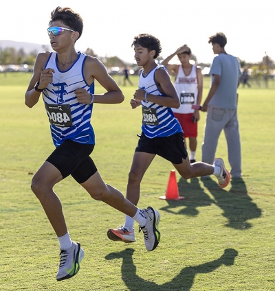 FHS runners Damian Santa Rosa and Aleks Laureano compete during the meet. Santa Rosa placed fifth overall, while Laureano finished sixth. Photo credit Coach Anthony Chavez.