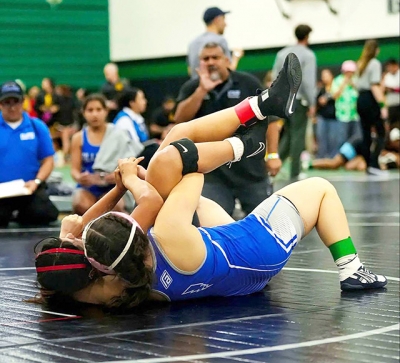 Above is Flashes Yosie Cruz vs. Selena Cruz of San Marcos High School at the Triton Scramble Tournament. Photo credit Michael Torres & Daniel Cruz.