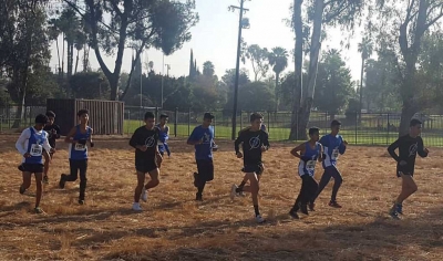 Flashes boys cross country team as they warm up before their race held in Riverside this past weekend.