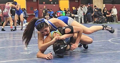 Pictured is Flashes Senior co-captain Skyla Sandoval also went 2-2 at 135 pounds.