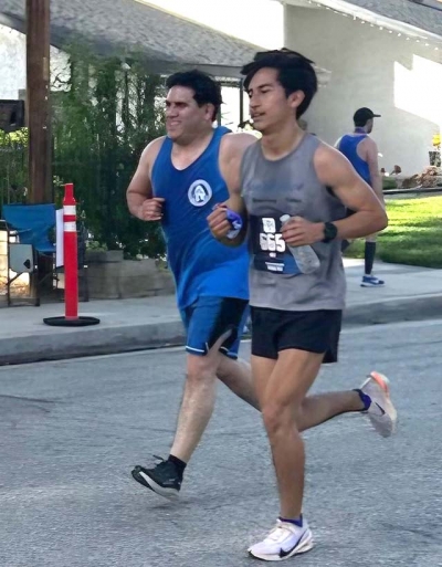 Pictured right are father and son Michael and Camilo Torres, finishing the Annual 4th of July 5K Race in Newhall.