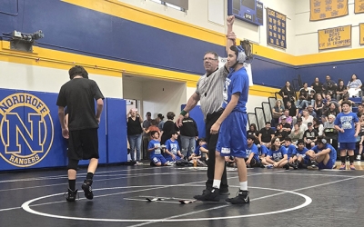 Pictured is Bulldogs Jesse Moten after defeating his opponent in his match. Photo credit Michael Torres & Cindy Vazquez.