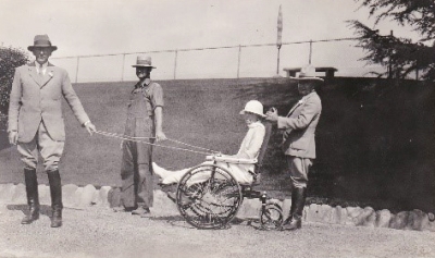 
Pictured above is Keith Spalding, left, with Eudora Hull Spalding in the wheelchair. Photo credit Fillmore Historical Museum. 
