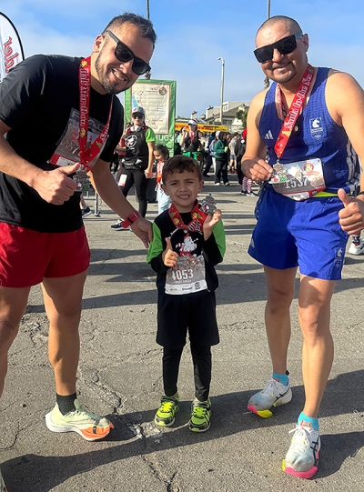 On Sunday, December 14, Fillmore and Piru runners participated in the 18th Annual Santa to Sea Run Half Marathon. Pictured is Fabian Ochoa and Martin Arredondo, and Angel Fabian Ochoa Arredondo, of Piru Elementary.