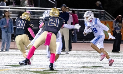 On Friday, October 23, the Flashes clinched the Tri-County League title with a victory over Dos Pueblos High School. Above, a Flashes player carries the ball downfield, looking to evade the defense with help from a teammate. This week, the Flashes will face their longtime rival, Santa Paula, at home. JV kickoff is at 4 p.m., followed by Varsity at 7 p.m. Photo credit Crystal Gurrola.