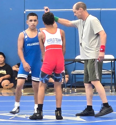 On Saturday, July 18, Fillmore High School hosted a Summer Wrestling Tournament with eight schools including FHS coming out to compete as they all prepare for the upcoming season. Pictured above is FHS wrestler Jasiah Cervantez after defeating his Buena High School opponent. Photo credit Michael Torres.