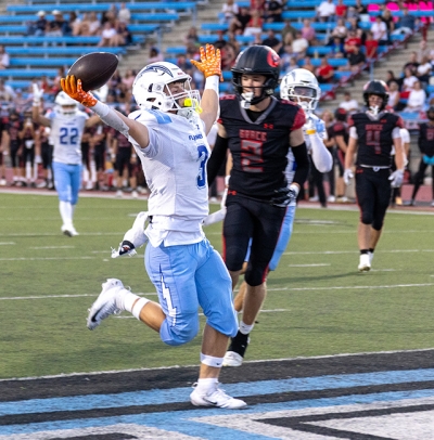 On Friday, September 11, Fillmore defeated defending CIF Grace champions. Above, FHS varsity player No. 3 raises his hand in celebration after scoring a touchdown during Friday night’s game. Photo credit Crystal Gurrola.