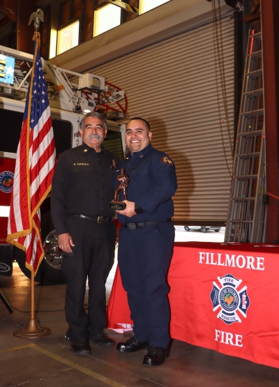 At Tuesday night’s City Council meeting Chief Keith Gurrola (left) and the City of Fillmore recognized Sal Ibarra for the 2023 Firefighter of the Year Award.