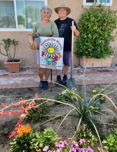 Civic Pride names Fillmore’s Juanita & Ray Morales as the July 2023 “Yard of the Month” award winners. Above are the two in their beautiful yard filled with red Yucca in bloom with Lantana, several Lavenders, Impatiens, Petunias, Dusty Miller, Delphinium, yellow Dutch Iris, Asparagus Fern & Mystic Spires Salvia around the Yucca. Photo credit Linda Nunes.