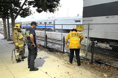  Inset, the scene of the August 2024 arson at the railway tracks where the same juvenile was arrested. Photo credit Angel Esquivel.