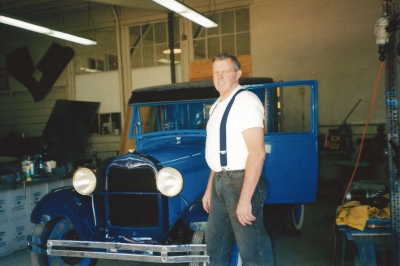 Above is Fillmore’s Lin Thomas who was able to leave his formal teaching career with pride when he retired in 2001 after over 37 years. During that time he restored a Model A Pickup, and drove it cross country in History Channel’s The Great Race. Inset is the car after being restored. Photos provided by Mike & Michelle Bly. 