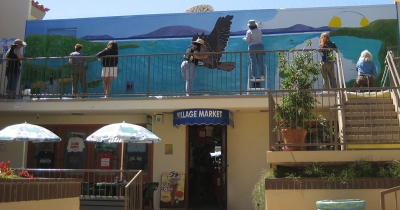 Local artists creating a mural in the Ventura Harbor Village in 2009.