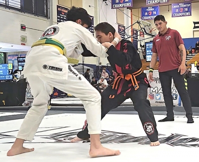 Above is Fillmore’s Mateo De La Cruz vs. a Machado Jiu Jitsu student. Photo credit Michael Torres.