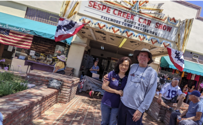 Sean McCulley and his wife Connie in front of the historic Fillmore Towne Theatre on Central Avenue.  Photo Credit Carina M. Montoya.