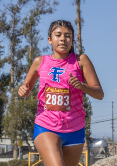 Pictured is Melanie Flores a first-year runner for Lady Flashes Cross Country team. She has trained and improved throughout the season. Her team will battle for the 1st place title in the Citrus Coast League on Thursday, November 7th. Photo credit Kim Tafoya.