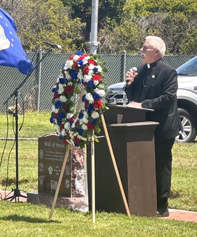 Pictured is the Rt. Rev. Robert Hammond who gave the inspirational speech, including Psalms 23 and 65, and Isaiah 25:6-9. He ended with John 15:13, “Greater love hath no man than this, that a man lay down his life for his friends.” Photo credit Gazette Staff.