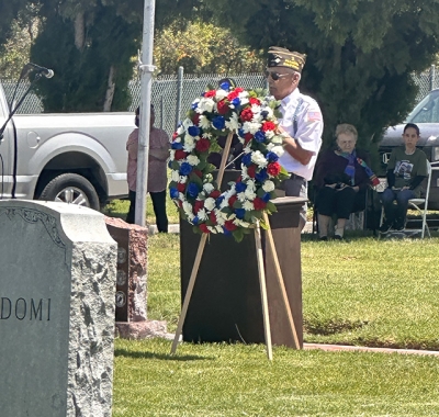 Pictured is Danny Golson reading the names of those who died in service of their country. Photo credit Gazette staff.