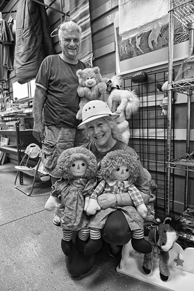 Terrie Metzler accepting a donation of toys by Milan Boyanich of A Street Self-Storage. The toys destined for the Shriner's Hospital for Children, Los Angeles.