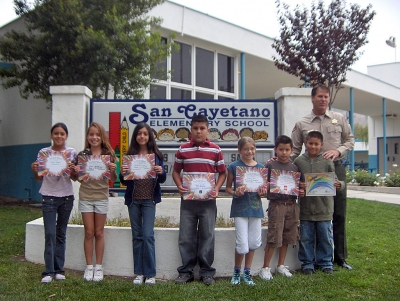 Capt. Tim Hagel with The Peacebuilders for September: Rachael Pace, Juan Garcia, Saul Santa Rosa, Alicia Fabian, Cali Wyand, Ignacio Alcala, Kayla Garcia, Sandra Chavez, Andrea Diaz, Karina Cisneros, Dulce Gonzalez, Lilly Diaz, Vanessa Cabral, Enrique Felix Jr., Ricky Cadena, Wendy Carrillo-Garcia, Eduardo Magana, Drew Myers, Valerie Esparza, Bella Villegas, Gustavo Granados, and Connel Ferguson.