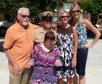 The Diaz family, Richard and Carolyn, with US Navy Chief Phillip Diaz, and his sisters Arron Diaz and Julia Fitzgibbons (Diaz).