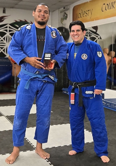 Pictured is Jose Ramirez with Coach Torres. Story and photo credit Coach Michael Torres & Silverio Garcia.