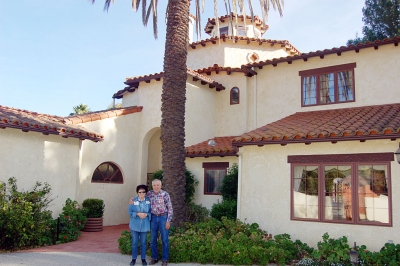 Esther and George Tamayo stand in front of their 8,000-square-foot house they built 19 years ago on Lingdooley Ranch in Santa Paula. Their home and barn are among four stops on the Barns, Ranches and Homes tour to benefit Santa Clara Vally Hospice on March 12, 2011.