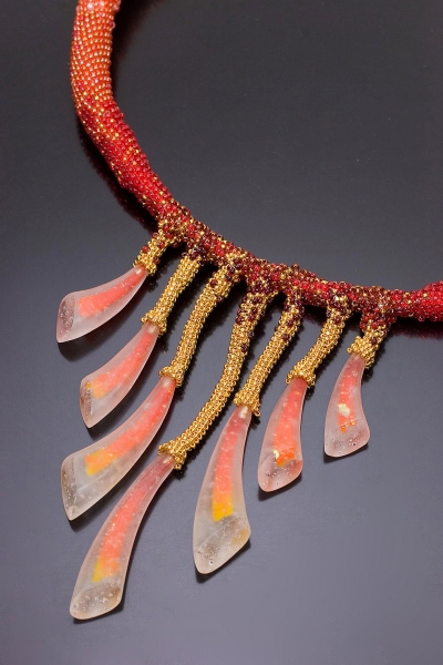 Detail of FireRing. A necklace by Dolores Barrett.