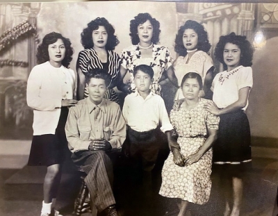 Pictured is the Cardona Family, circa 1945. Standing (l-r): Amelia, Loisa, Juana, Monica, and Pini; Front row: Marcos, Faustino, and Georgia. Photo courtesy Fillmore Historical Museum..